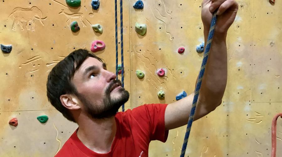 Two smiling climbers at Redpoint climbing centre