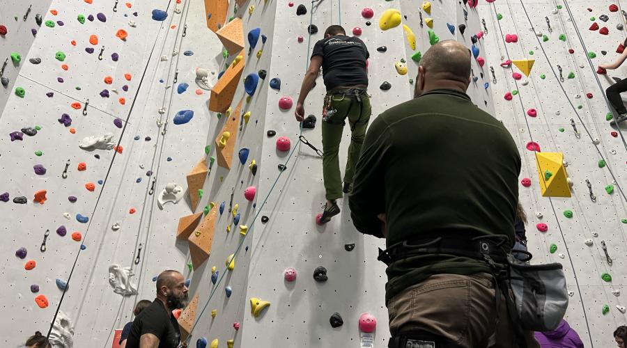 Outdoorlads climbers on the rainbow feature wall