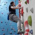 Wide shot of climber on wall