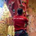 Two smiling climbers at Redpoint climbing centre