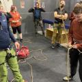 Outdoorlads climbers on the rainbow feature wall