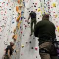 Outdoorlads climbers on the rainbow feature wall