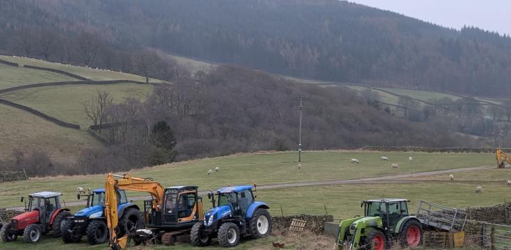 The camping field behind tractors